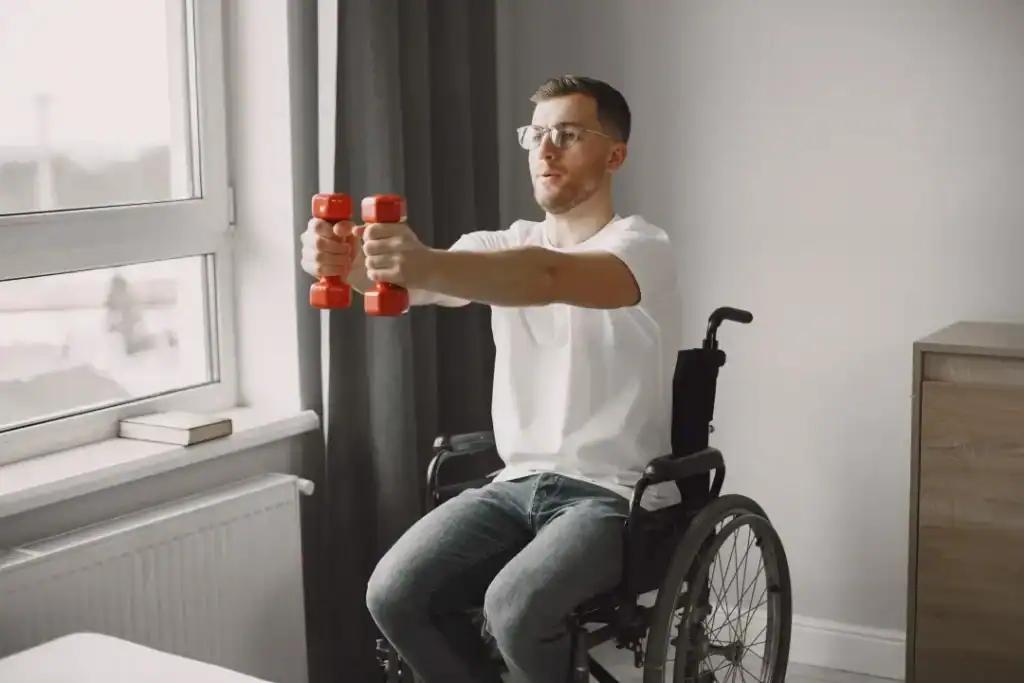Empowering Weight Loss: A Comprehensive Guide for Individuals with Disabilities 1 Image of man doing exercise in his wheelchair to aid weight loss Wivenhoe