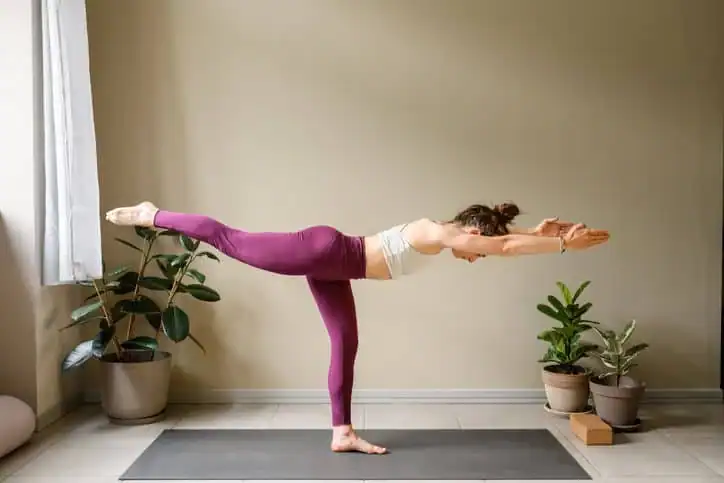 Achieving the Perfect Tone: How Often Should You Exercise for Results? 1 Woman doing Yoga exercise Wivenhoe to help with toning the body.