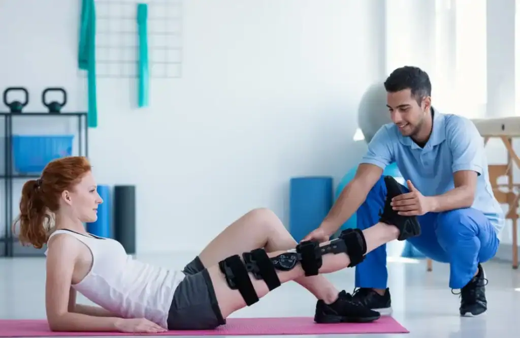 Woman having treatment to help muscle recovery Wivenhoe after an injury