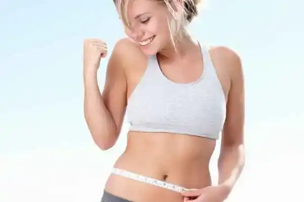 Unraveling the Mystery: Where Does the Body Fat Loss From First? 3 Image of woman happy with fat loss Wivenhoe