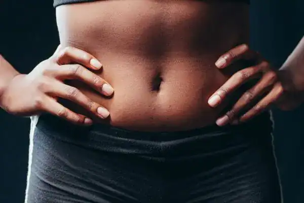 Toning Your Stomach: The Ultimate Guide to Achieving a Sculpted Stomach While Shedding Pounds 1 Image of a toned stomach after non surgical treatment Wivenhoe